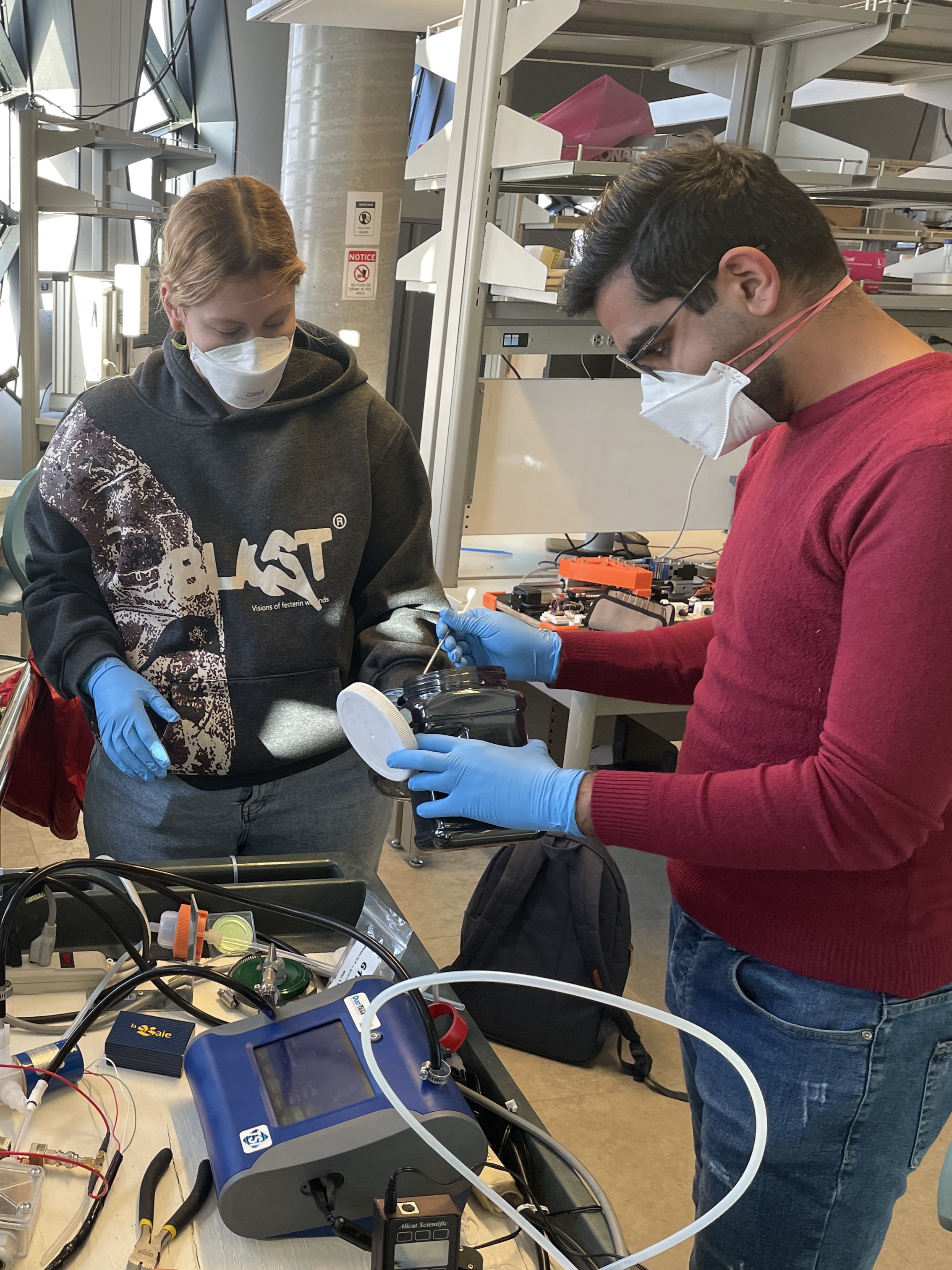 Two team members working in the laboratory